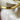 Trina Turk goldtone hinged leaf cuff bracelet - NextStage Vintage
