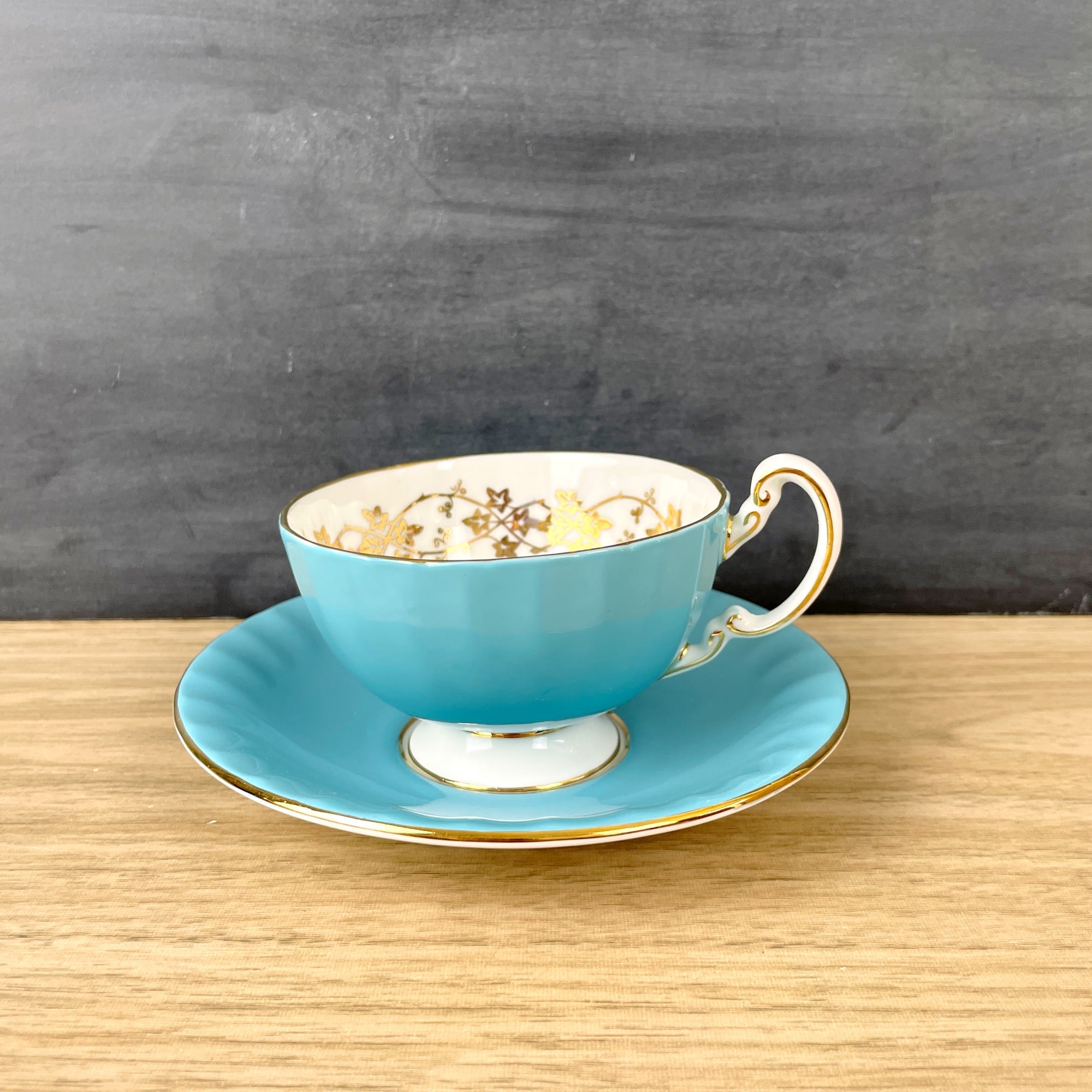 Aynsley turquoise tea cup with floral lining – NextStage Vintage