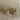 Knotted golden clip on earrings with rhinestones - 1980s vintage costume jewelry - NextStage Vintage