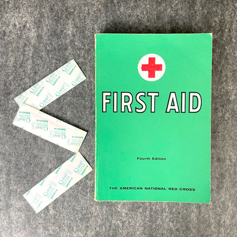 First Aid - Fourth Edition - Red Cross textbook - 1957- green softcover - NextStage Vintage