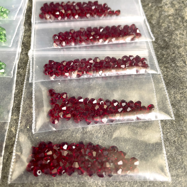 3mm bicone crystal beads Swarovski? - 528 pcs - Christmas red and green - estate destash