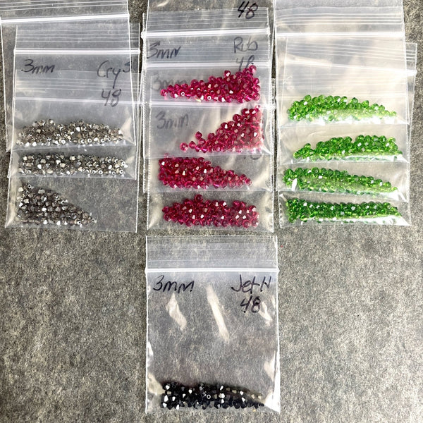 3mm bicone crystal beads Swarovski? - 576 pcs - Kwanzaa colors - estate destash