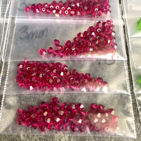 3mm bicone crystal beads Swarovski? - 576 pcs - Kwanzaa colors - estate destash