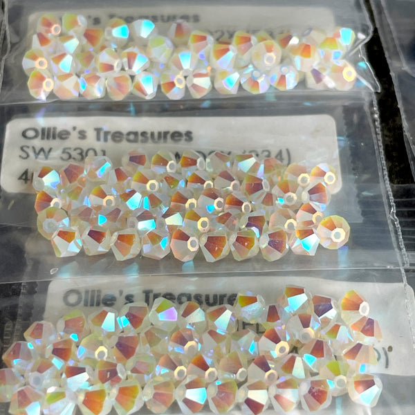 Swarovski 5301 4mm bicone crystal beads - 720 pcs - heliotrope, white opal, silver, blue and gold