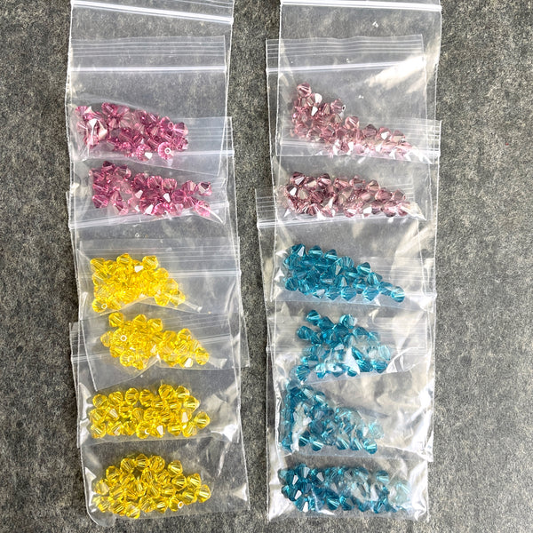 5mm bicone crystal beads - Swarovski? - 288 pcs - purple, blue, golden yellow