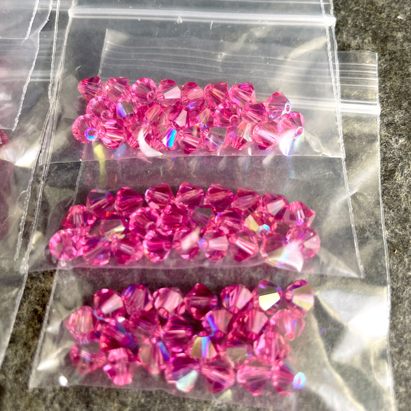 5mm bicone crystal beads Swarovski? - 288 pcs - pinks, purples - estate destash