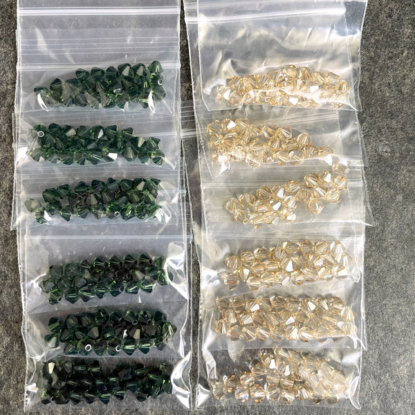 5mm bicone crystal beads Swarovski? - 288 pcs - green, topaz - estate destash