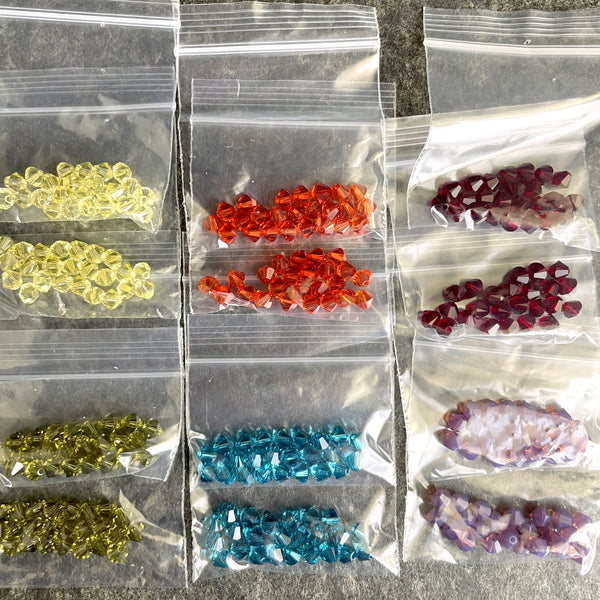 5mm bicone crystal beads Swarovski? - 288 pcs - muted rainbow