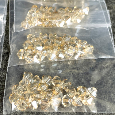 5mm bicone crystal beads Swarovski? - 288 pcs - light and dark topaz - NextStage Vintage