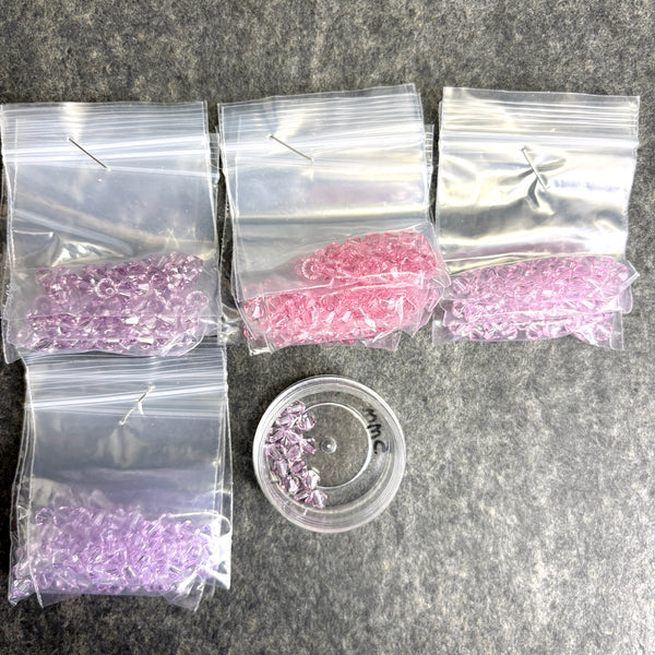 447 pcs 5mm bicone crystal beads - Swarovski? - pastel pinks and purples