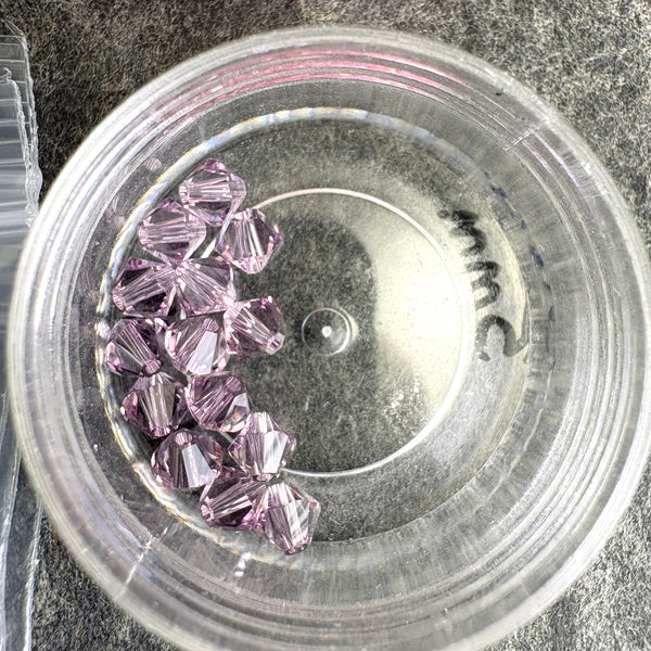 447 pcs 5mm bicone crystal beads - Swarovski? - pastel pinks and purples
