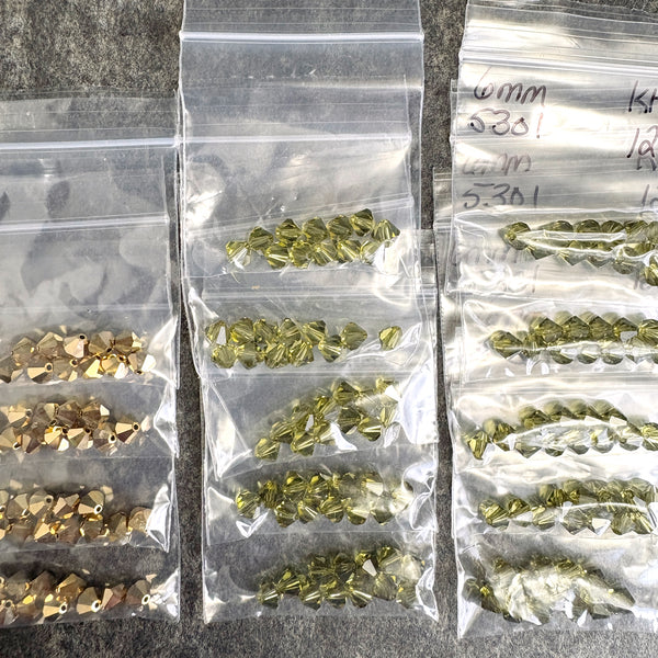 168 pc 6mm crystal bicone beads - green, gold - Swarovski? estate destash