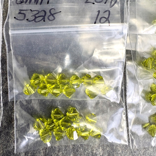 192 bicone crystal beads 6mm - lt olivine, topaz - Swarovski? - destash lot - NextStage Vintage