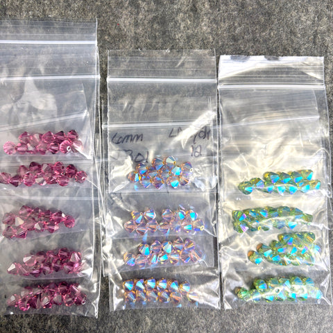 156 pcs 6mm crystal bicone beads - LAmy2x, green2x, purple - Swarovski? destash