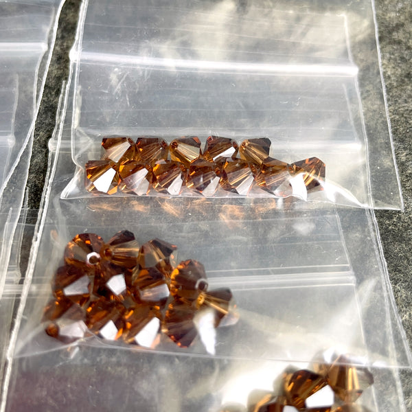 6mm crystal bicone beads Swarovski? - 144 pc. - brown, orange, yellow - estate destash