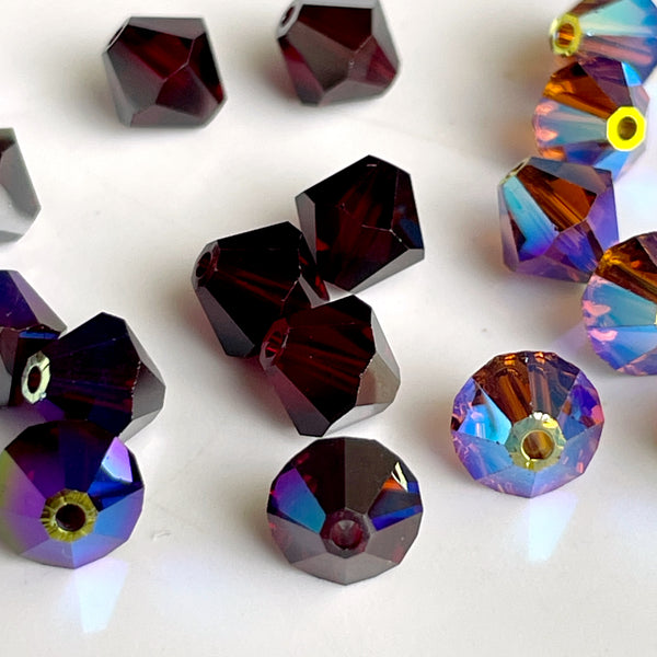 6mm crystal bicone beads Swarovski? - 144 pc - reds, purples - estate destash