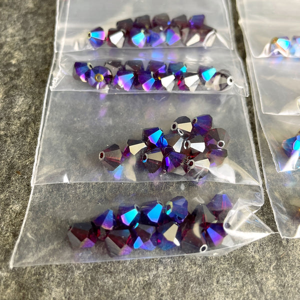 6mm crystal bicone beads Swarovski? - 144 pc - reds, purples - estate destash