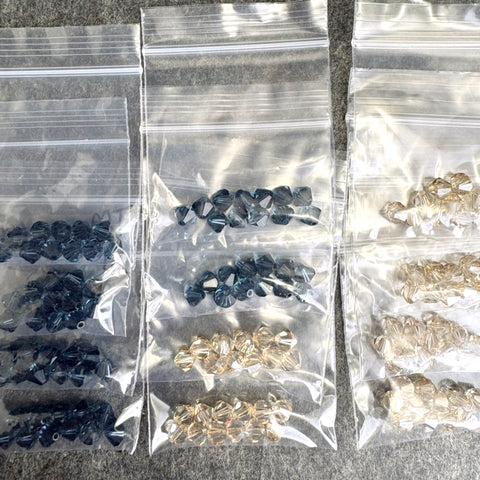 144 pcs 6mm crystal bicone beads - montana and ginger ale - Swarovski?