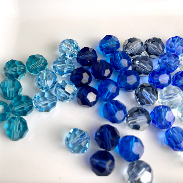 8mm round crystal beads - Swarovski? - 96 pcs - blue assortment