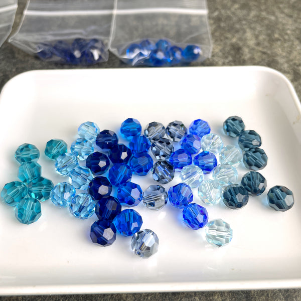 8mm round crystal beads - Swarovski? - 96 pcs - blue assortment