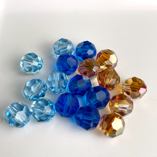 8mm round crystal beads - Swarovski? - 96 pcs - blue and topaz