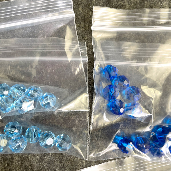 8mm round crystal beads Swarovski? - 108 pcs - 8 color assortment