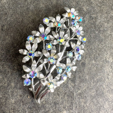 Floral spray rhinestone brooch - silvertone with aurora borealis crystals - NextStage Vintage