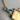 Alexis Bittar champagne lucite and turquoise colored stone and crystal pendant necklace - NextStage Vintage