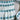 Vintage handmade half apron – blue grid pattern with “stitched” floral print – pleated cotton - NextStage Vintage