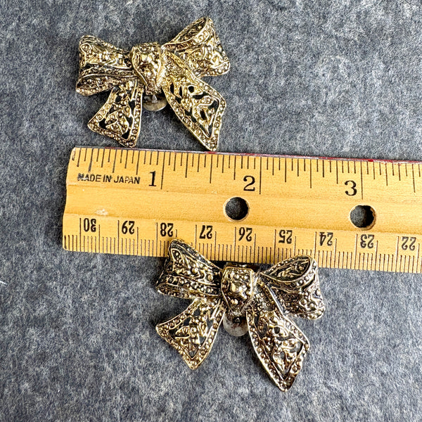 Goldtone bows S.G.D'or dress clips - vintage 60s jewelry