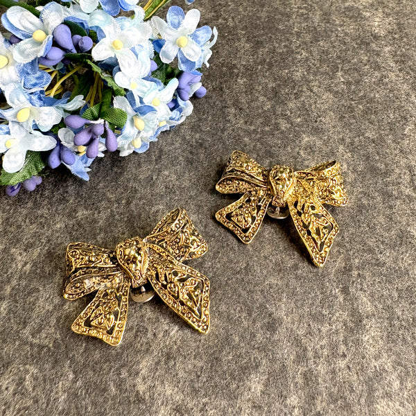Goldtone bows S.G.D'or dress clips - vintage 60s jewelry