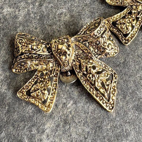 Goldtone bows S.G.D'or dress clips - vintage 60s jewelry