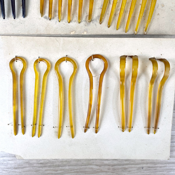 Celluloid hair combs and hairpins on store display - 1940s vintage - NextStage Vintage
