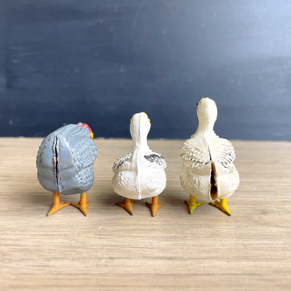 Compostion putz ducks and rooster with metal feet - possibly German