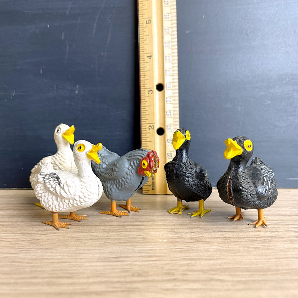 Compostion putz ducks and rooster with metal feet - possibly German