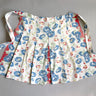 Vintage mid-century handmade half apron – floral toweling fabric, pleated, red selvedge trim - NextStage Vintage