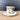 Gold iridescent demitasse cup and saucer with hand painted bell flowers - NextStage Vintage