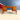 Wooden dollhouse furniture – Queen Anne red velvet settee & Victorian kneehole desk