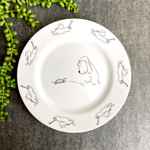 decorative plate with James Thurber illustrations of a dog and a turtle