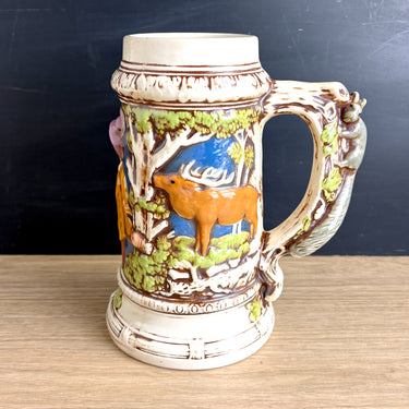 Oversized ceramic stein hand painted - 1970s vintage - deer hunter squirrel trees - NextStage Vintage