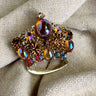Lisner crown brooch with iridescent peach rhinestones - 1960s vintage - NextStage Vintage