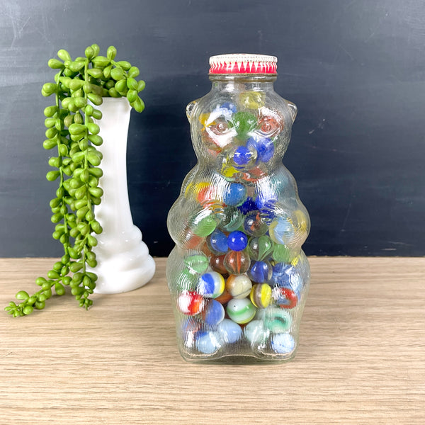 Snow Crest glass bear bank filled with vintage marbles - NextStage Vintage