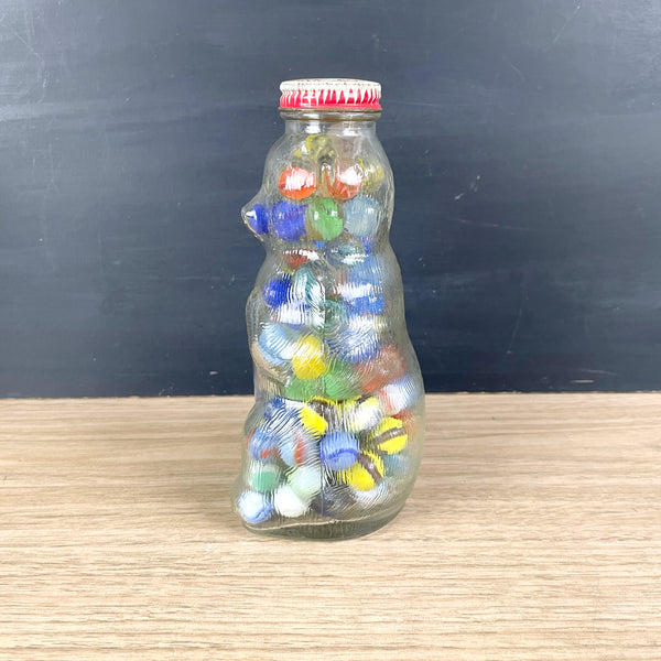 Snow Crest glass bear bank filled with vintage marbles - NextStage Vintage