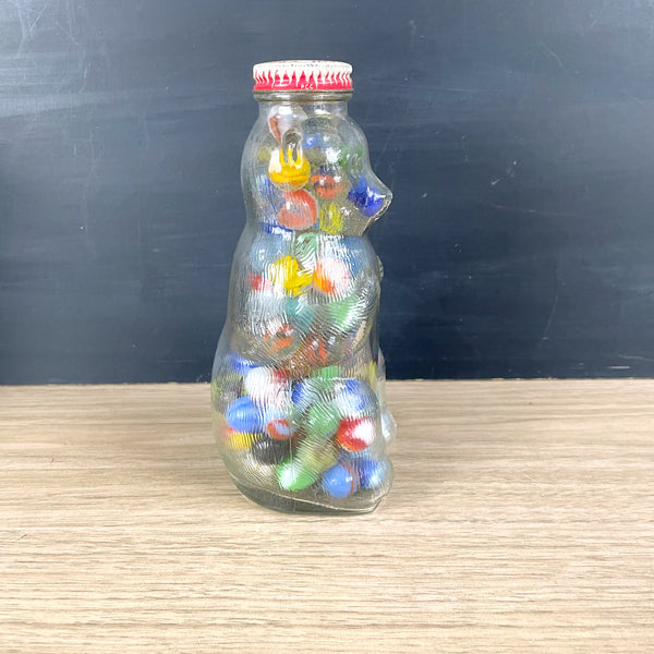 Snow Crest glass bear bank filled with vintage marbles - NextStage Vintage