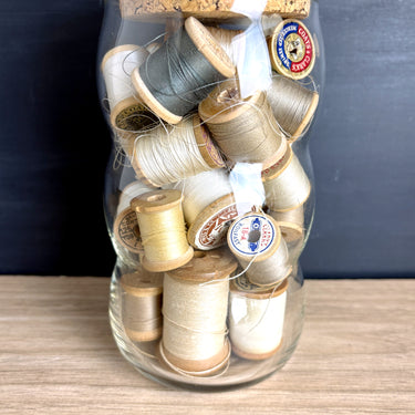 Vintage Wooden Thread Spools in Bubble Glass Jar with Cork Lid - Neutral Tones - Sewing Room — Shelf Decor - NextStage Vintage