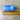 Blue hard plastic advertising piggy bank - 1970s vintage - NextStage Vintage