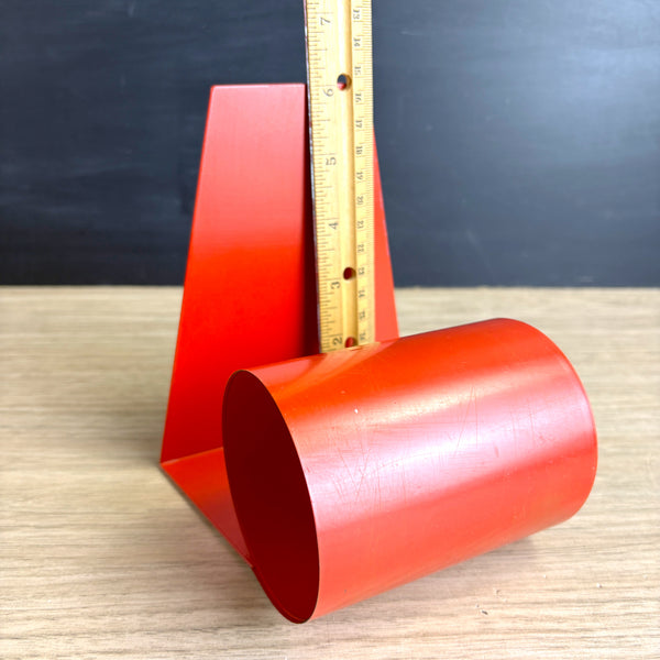 Coiled steel bookworm bookend - 1960s vintage - bright red - orange