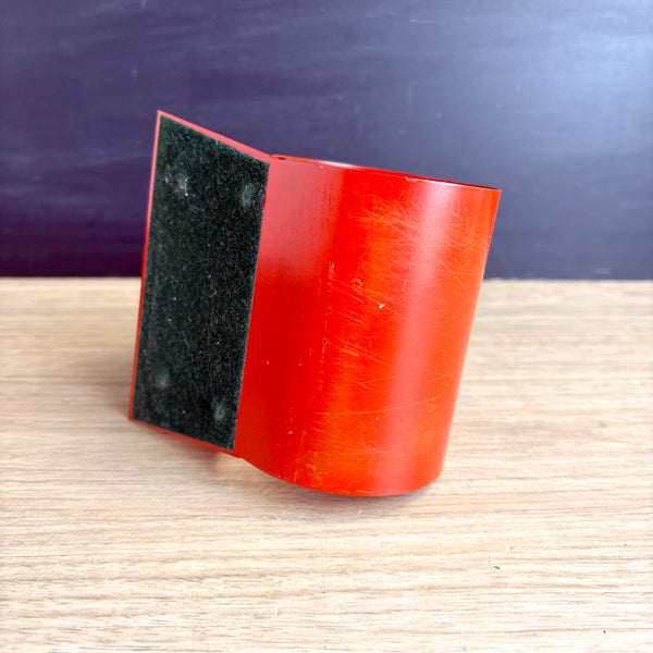 Coiled steel bookworm bookend - 1960s vintage - bright red - orange