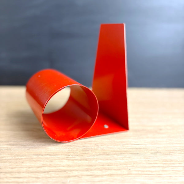 Coiled steel bookworm bookend - 1960s vintage - bright red - orange