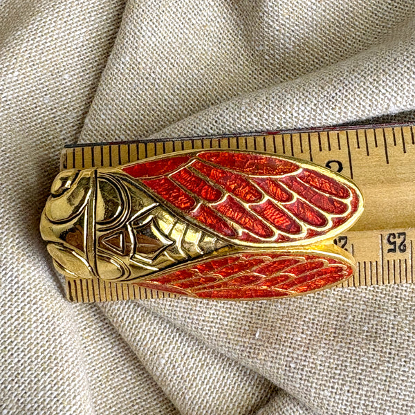 René Gouin goldtone and orange resin cicada brooch - vintage costume jewelry